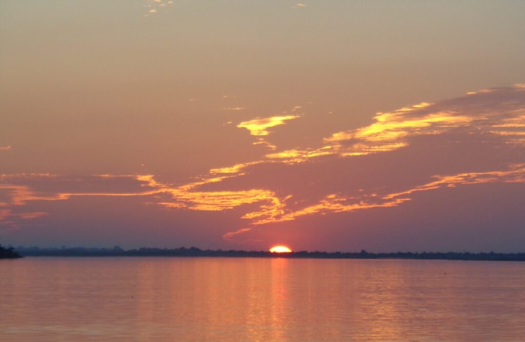 A photo of the Sun Set on the river the Brahmaputra
