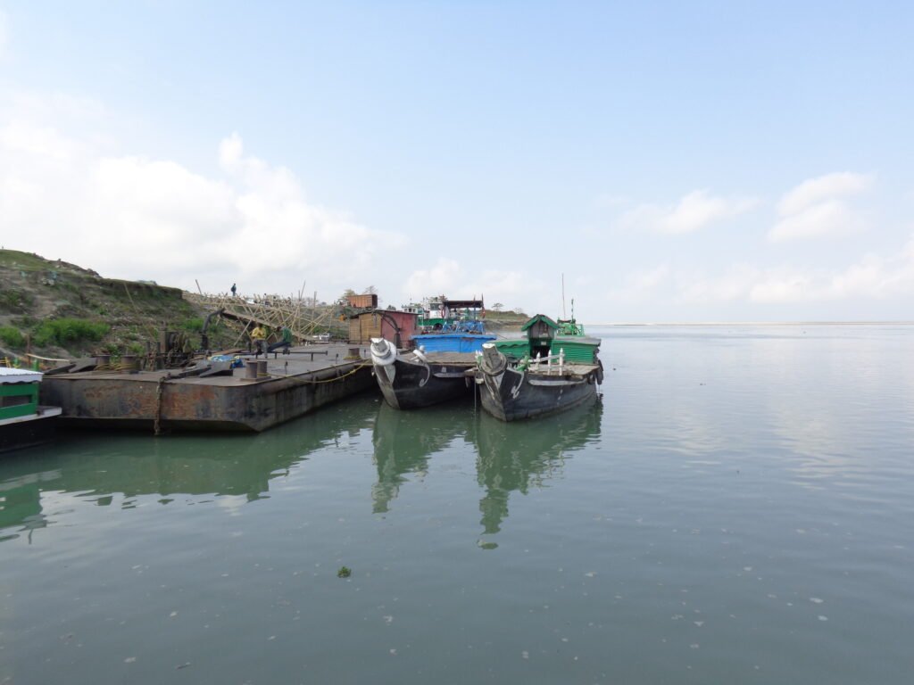 A ferry is anchored at the bank of the river Brahmaputra