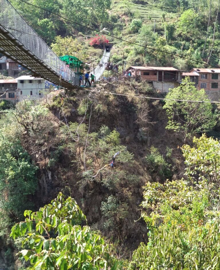 A person is jumping from a bungee jumping point