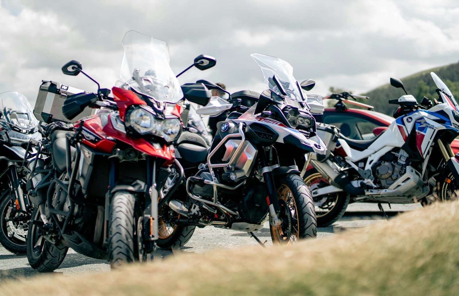 a group of motorcycles parked next to each other